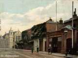 [Church Street, featuring the old fire station with the Lamb Institute in the background.]