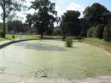 [The boating lake (?) in Pymmes Park (10/08/2002).]