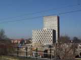 [The last few floors of Camelot House remained next to Pendragon House in March 2003.]