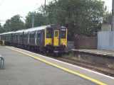 [317 331 in WAGN&nbsp;purple livery at Seven&nbsp;Sisters (21/06/2004).]