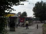 [A new stop on the west side of The Broadway replaced a temporarty alighting only one (27/08/2004).]