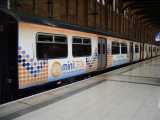 [317 7xx at Liverpool&nbsp;St showing advertising livery (30/08/2005).]