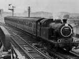 [N7 69660 and quintart set approaching Seven Sisters 11/10/1958 - &copy; K L Cook, taken from Trains Illustrated]