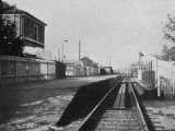 [A view along the original low level station platforms towards Edmonton&nbsp;Junction c. 1959.]